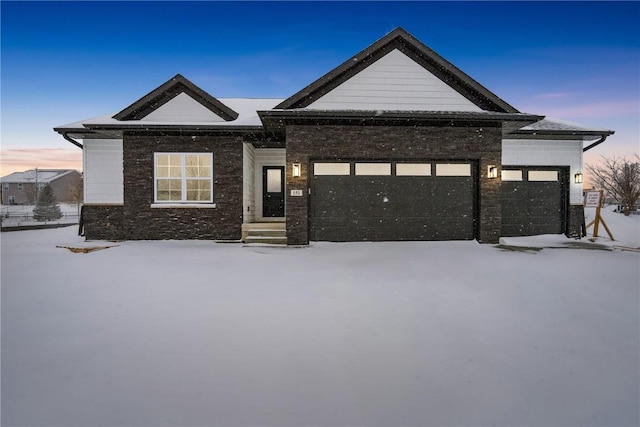 view of front of property featuring a garage