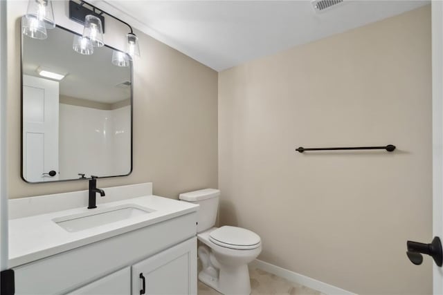 bathroom with vanity and toilet