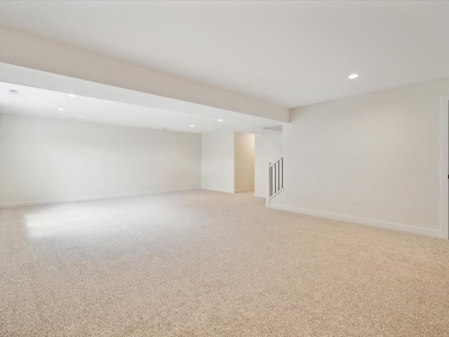 261 Colchester Dr, Iowa City, IA 52245 - spare room featuring light colored carpet, recessed lighting, and baseboards
