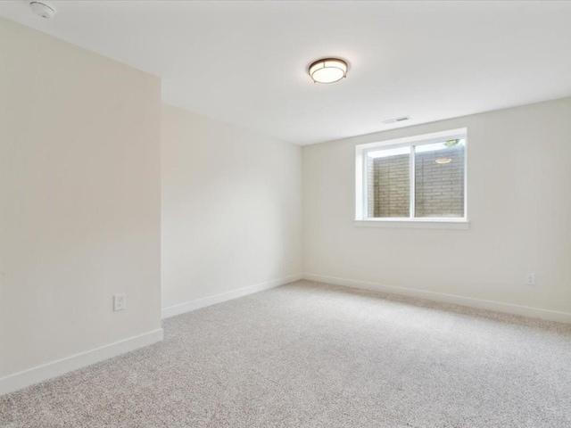 261 Colchester Dr, Iowa City, IA 52245 - carpeted empty room with baseboards and a smoke detector