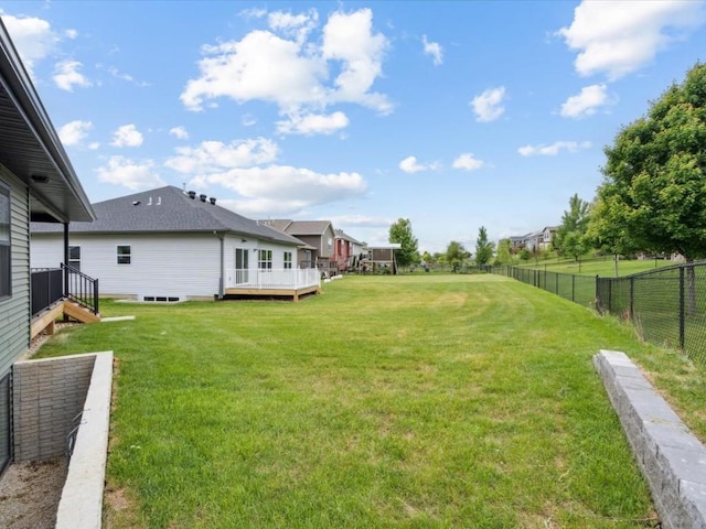 261 Colchester Dr, Iowa City, IA 52245 - view of yard featuring a deck