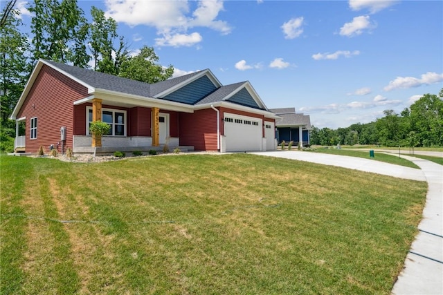 view of front of home featuring a porch, a garage, and a front lawn