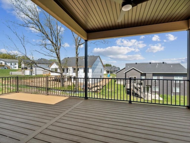 1423 Legend Dr, Tiffin, IA 52340 - deck with a residential view, a yard, and ceiling fan