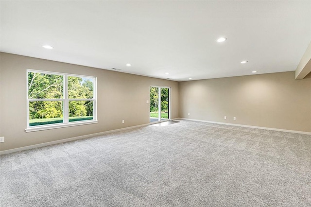 empty room with light colored carpet