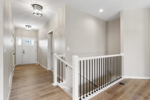 foyer entrance with light wood-type flooring