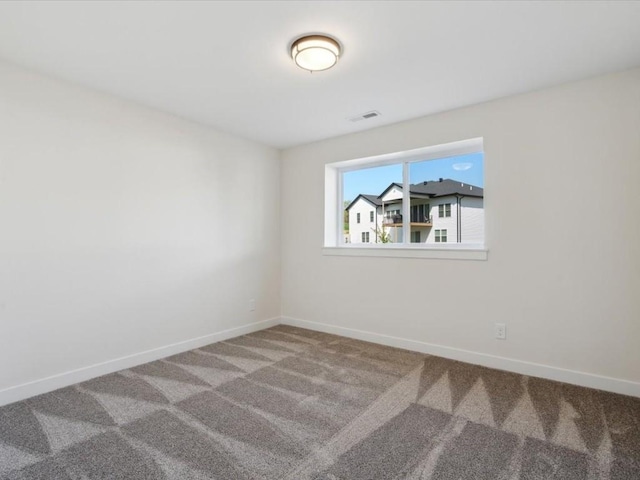 1501 Legend Dr, Tiffin, IA 52340 - empty room featuring carpet and baseboards
