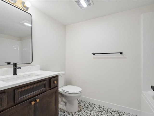 1501 Legend Dr, Tiffin, IA 52340 - full bathroom featuring toilet, baseboards, vanity, and a shower