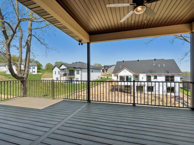 1501 Legend Dr, Tiffin, IA 52340 - wooden deck with ceiling fan and a residential view