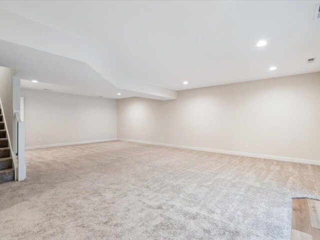 314 Sierra Trce, Coralville, IA 52241 - finished basement with recessed lighting, carpet floors, and stairway