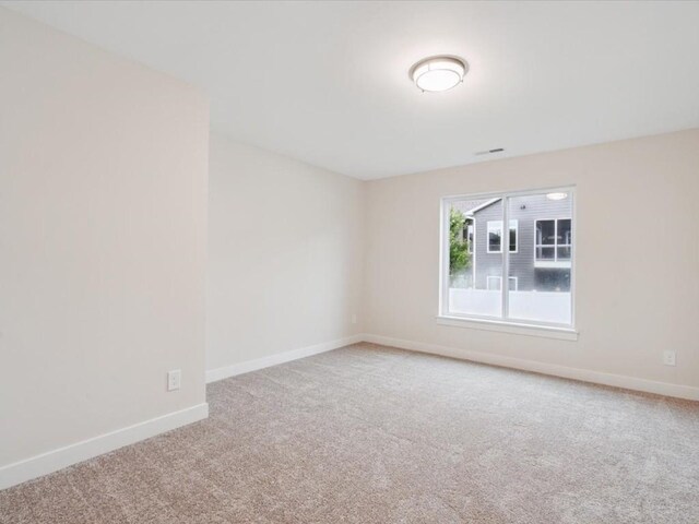 314 Sierra Trce, Coralville, IA 52241 - unfurnished room featuring carpet floors and baseboards