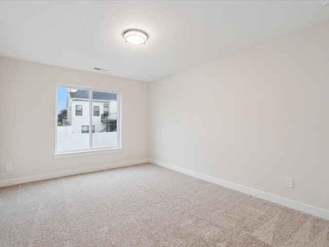 314 Sierra Trce, Coralville, IA 52241 - carpeted spare room featuring baseboards