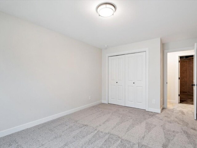 314 Sierra Trce, Coralville, IA 52241 - unfurnished bedroom with carpet and a closet