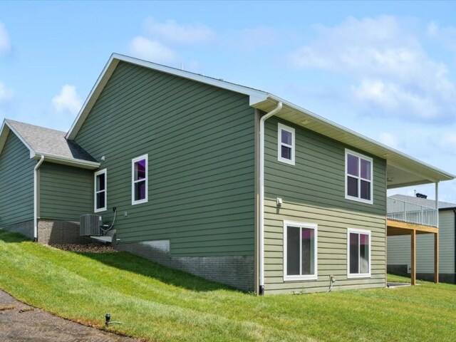 314 Sierra Trce, Coralville, IA 52241 - back of house featuring a lawn