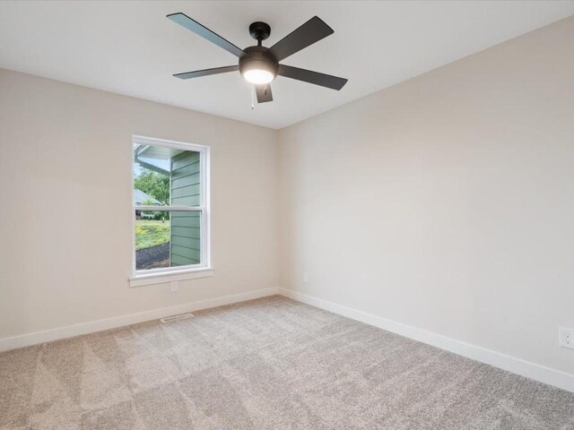 314 Sierra Trce, Coralville, IA 52241 - carpeted spare room featuring baseboards and ceiling fan