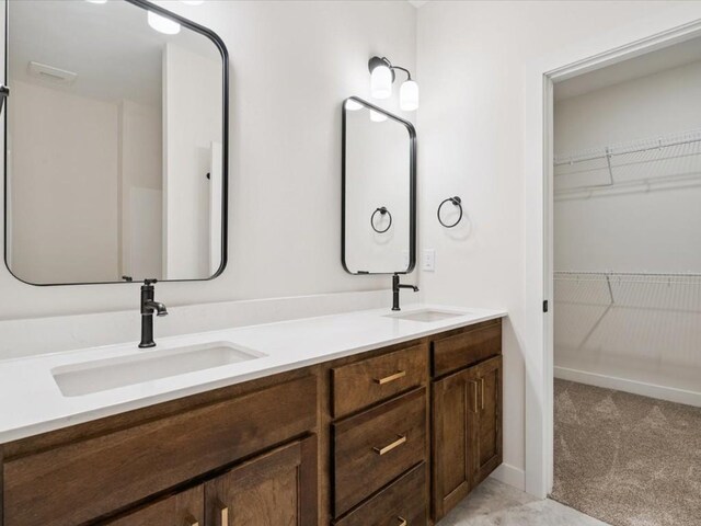 318 Sierra Trce, Coralville, IA 52241 - full bath featuring double vanity and a walk in closet