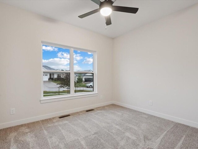 318 Sierra Trce, Coralville, IA 52241 - unfurnished room featuring carpet flooring and a ceiling fan