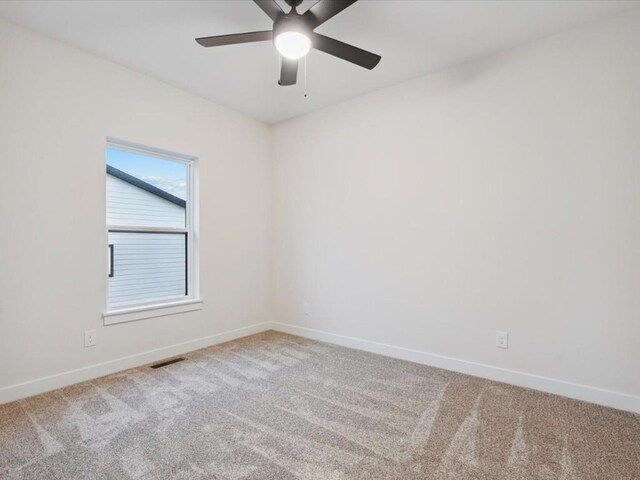 318 Sierra Trce, Coralville, IA 52241 - unfurnished room with carpet and a ceiling fan