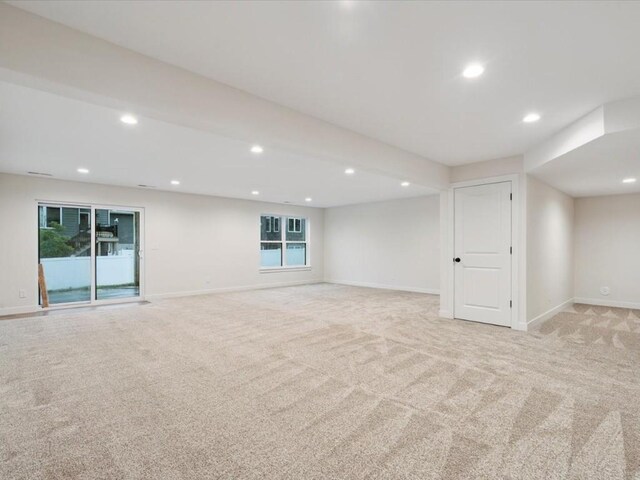318 Sierra Trce, Coralville, IA 52241 - unfurnished room with light colored carpet and recessed lighting