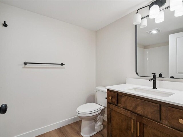 318 Sierra Trce, Coralville, IA 52241 - bathroom with wood finished floors and vanity