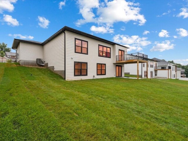 318 Sierra Trce, Coralville, IA 52241 - back of house with a yard and a wooden deck