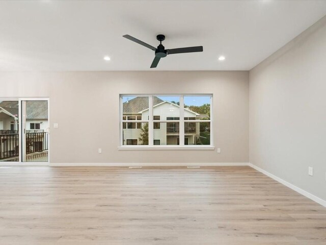 322 Sierra Trce, Coralville, IA 52241 - empty room featuring light wood-type flooring, a ceiling fan, and recessed lighting