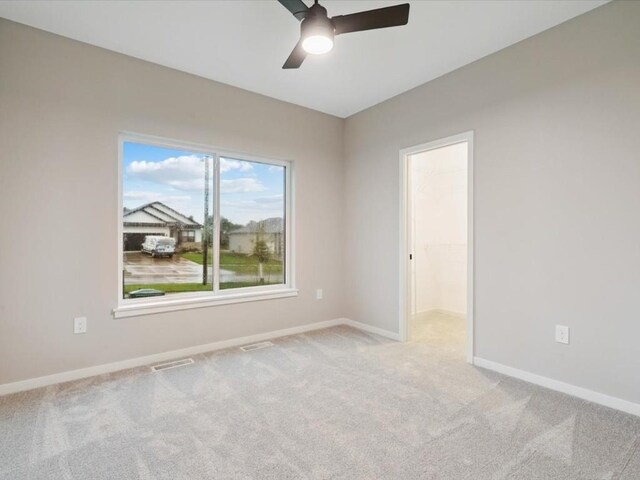 322 Sierra Trce, Coralville, IA 52241 - empty room featuring a ceiling fan and light carpet