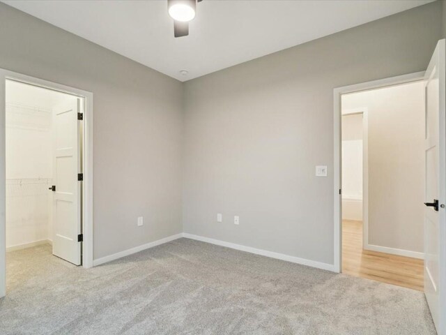 322 Sierra Trce, Coralville, IA 52241 - carpeted empty room with baseboards and a ceiling fan