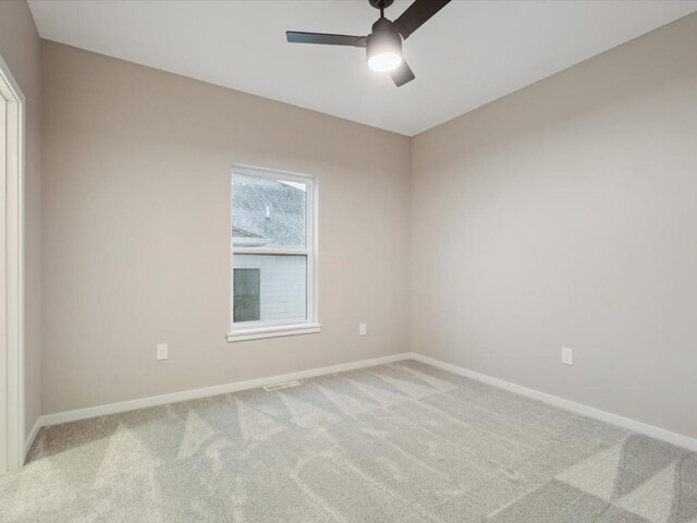 322 Sierra Trce, Coralville, IA 52241 - carpeted empty room featuring ceiling fan and baseboards