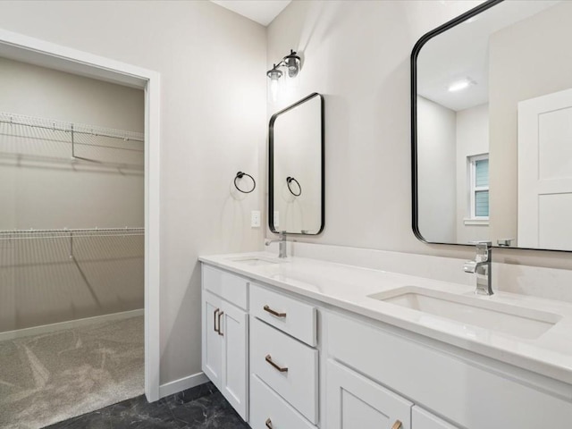322 Sierra Trce, Coralville, IA 52241 - full bathroom featuring double vanity and a walk in closet