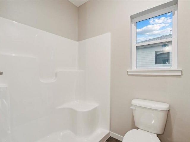 322 Sierra Trce, Coralville, IA 52241 - bathroom with toilet and a shower