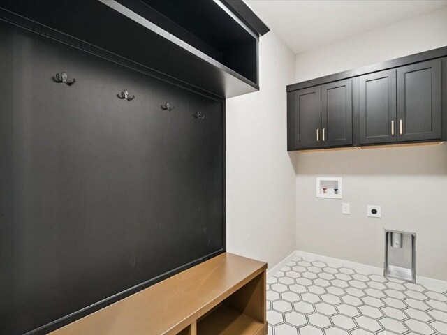 322 Sierra Trce, Coralville, IA 52241 - laundry room featuring washer hookup, tile patterned floors, and electric dryer hookup