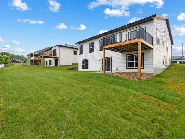 322 Sierra Trce, Coralville, IA 52241 - back of property featuring a yard and a deck