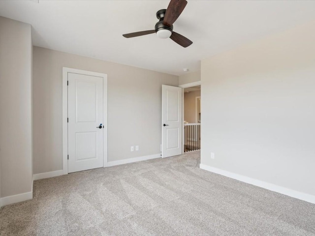 4648 Preston Ln, Iowa City, IA 52246 - unfurnished bedroom with carpet floors and ceiling fan
