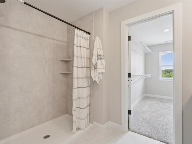 4648 Preston Ln, Iowa City, IA 52246 - bathroom with curtained shower and marble finish flooring