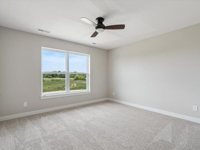 4648 Preston Ln, Iowa City, IA 52246 - unfurnished room featuring carpet and a ceiling fan