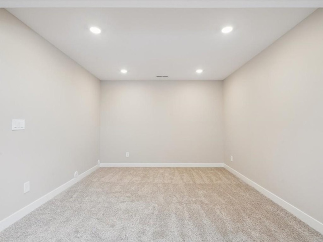 4648 Preston Ln, Iowa City, IA 52246 - empty room featuring light colored carpet and recessed lighting
