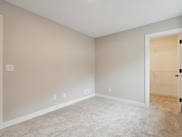 4648 Preston Ln, Iowa City, IA 52246 - carpeted empty room with baseboards
