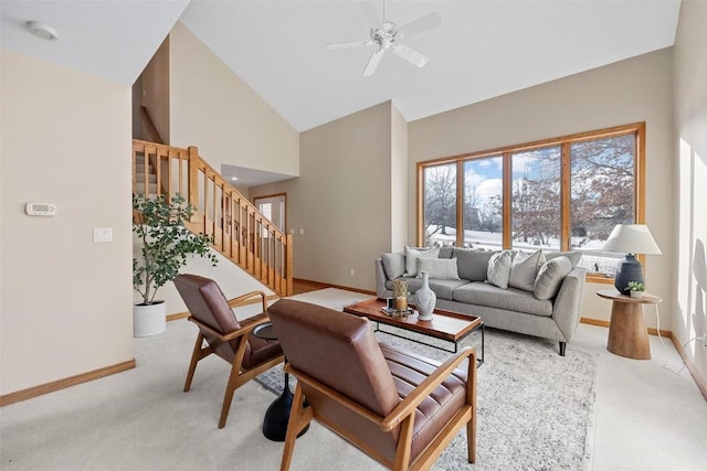 living room featuring light carpet, high vaulted ceiling, and ceiling fan