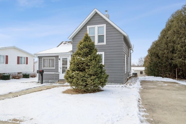 view of snow covered property