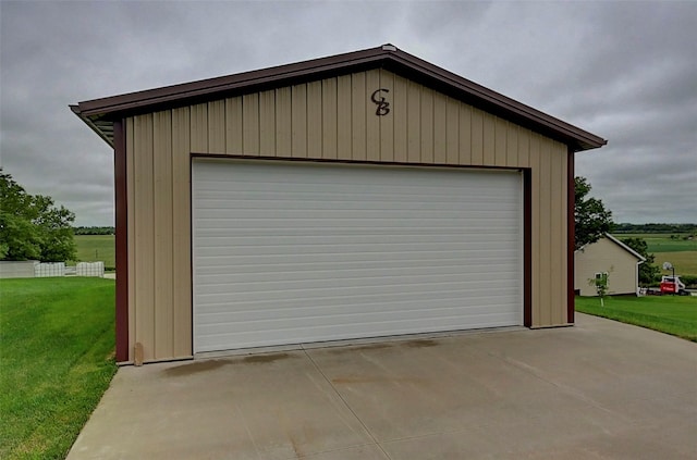 garage with a lawn