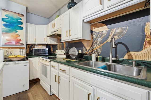 kitchen featuring electric range, sink, white cabinets, and dark wood-type flooring