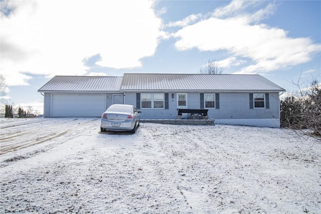 single story home featuring a garage