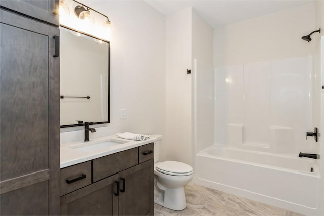 bathroom with shower / bath combination, toilet, and vanity