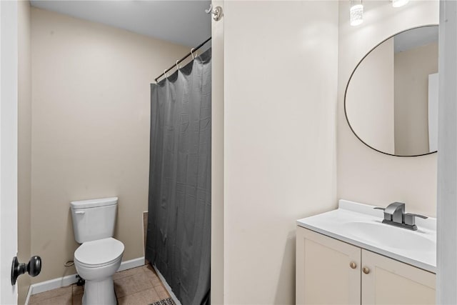 bathroom with tile patterned flooring, vanity, curtained shower, and toilet