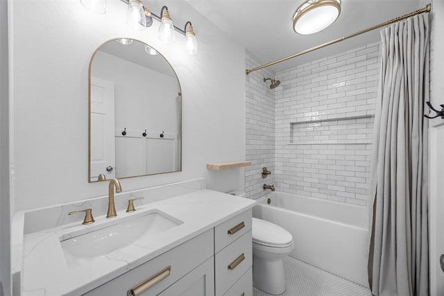 full bathroom with tile patterned flooring, vanity, toilet, and shower / tub combo