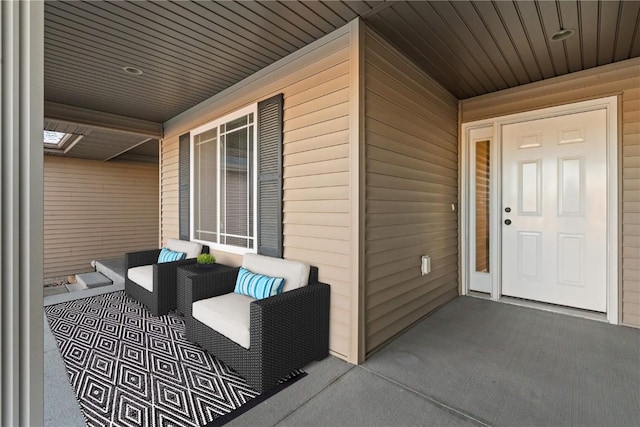 doorway to property featuring covered porch