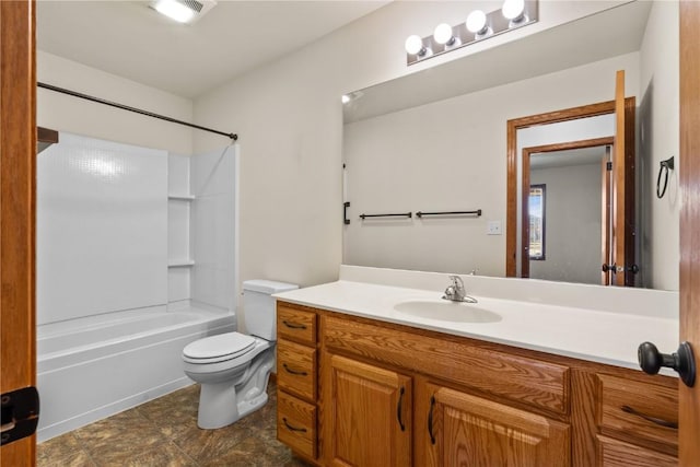 full bathroom with vanity, bathing tub / shower combination, and toilet