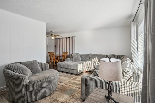 living room featuring ceiling fan