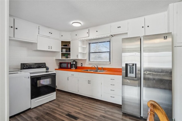 kitchen featuring white cabinets, white appliances, and sink