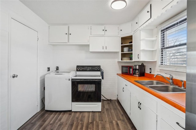 kitchen featuring electric range, white cabinetry, sink, and dark wood-type flooring